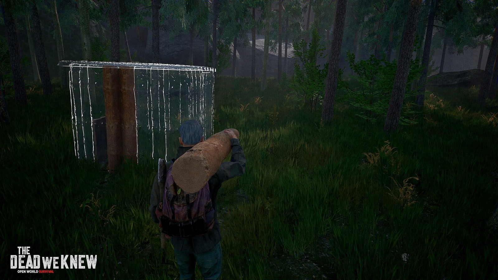 Player carrying a log into a wireframe shelter blueprint in foggy forest